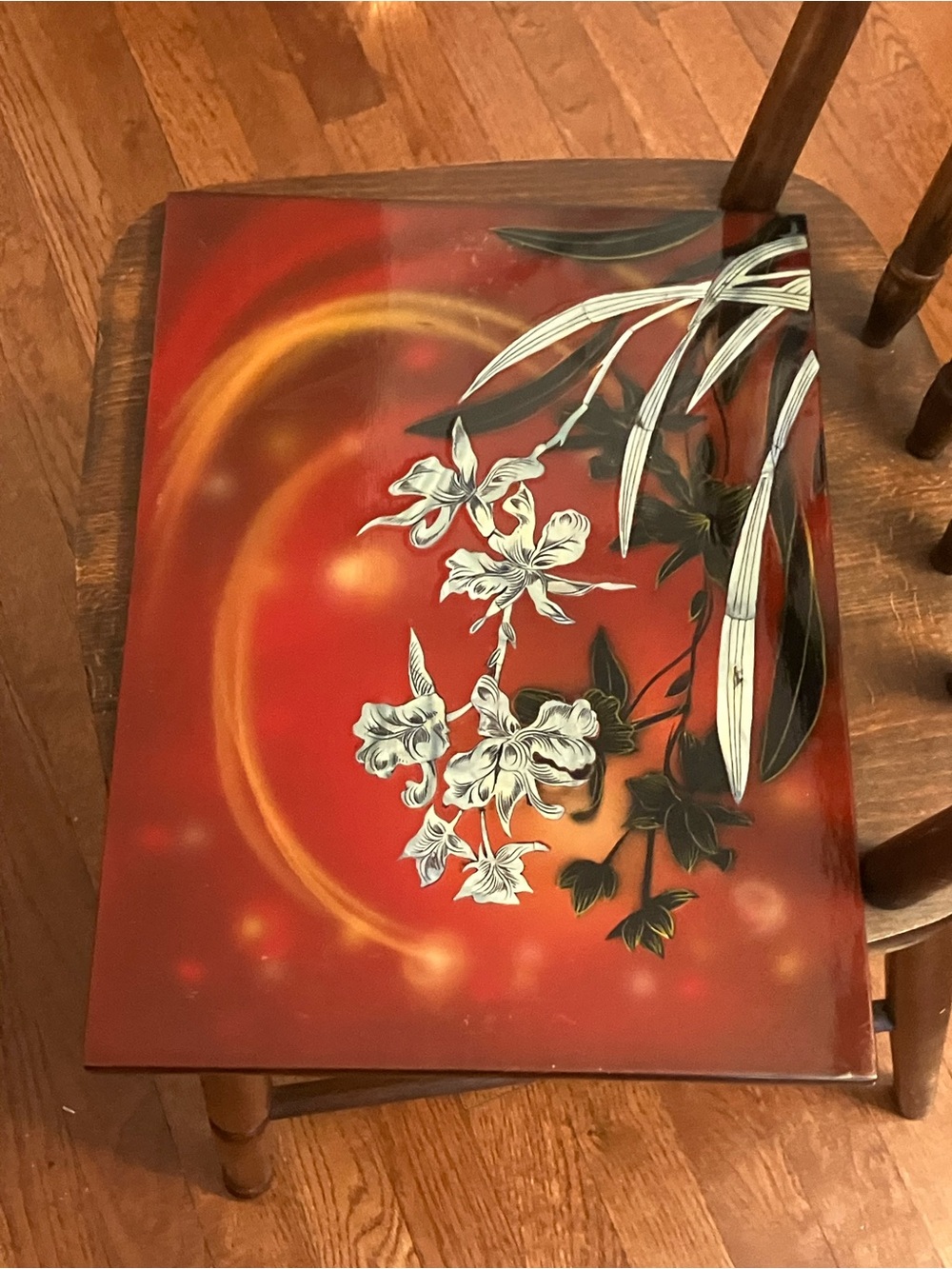 Thai Floral Art Piece on Red Background